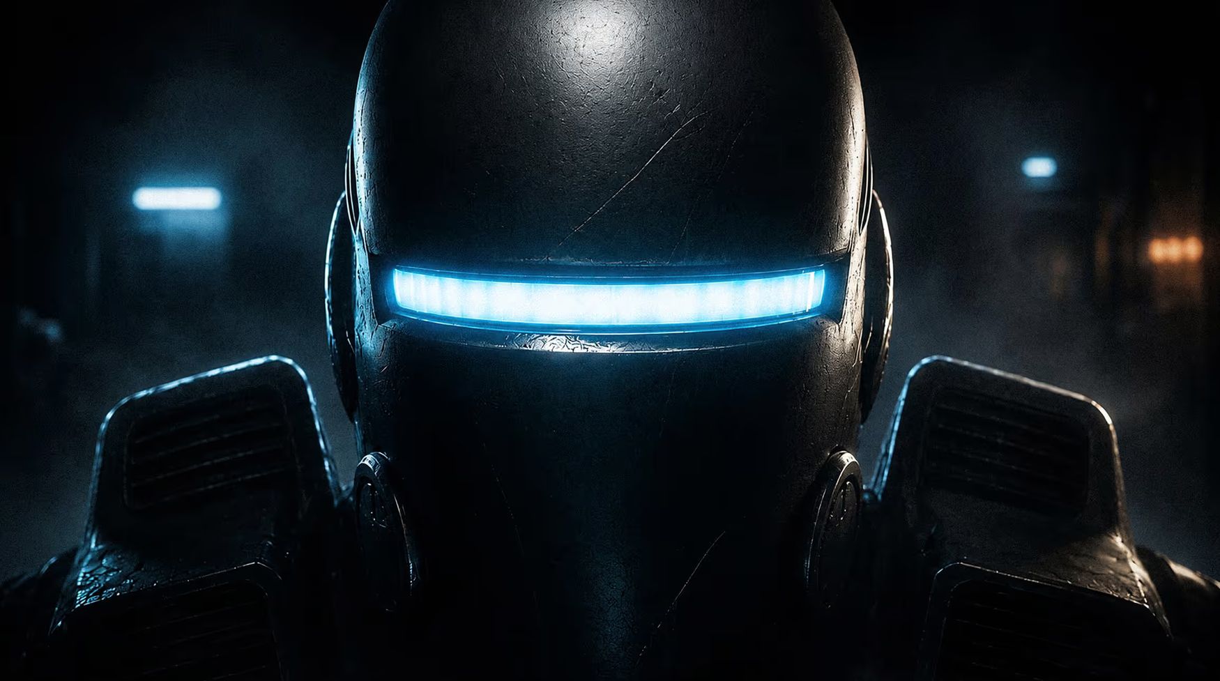 Close-up of a dark futuristic robot head with a glowing blue horizontal visor in a dim setting.